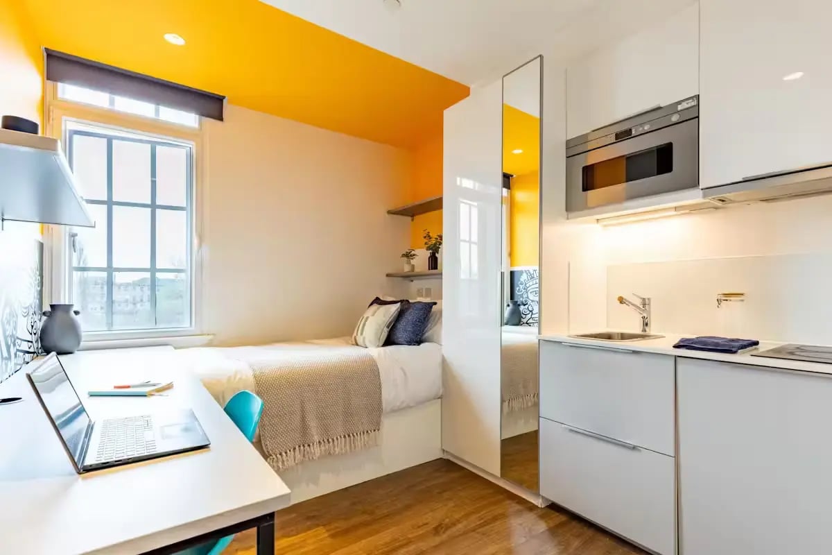 Bed desk kitchen and microwave studio apartment at Riverside Glasgow in Glasgow Student Accommodation