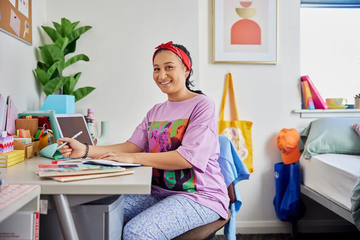 Desk plant tablet bed study area bedroom at Mountain x Scape in Sydney Student Accommodation