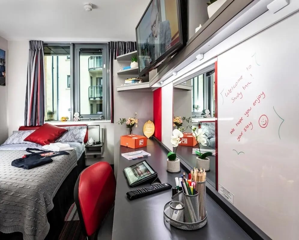 Bed desk and whiteboard student room interior at Study Inn Loughborough - Lemyngton Street in Loughborough Student Accommodation