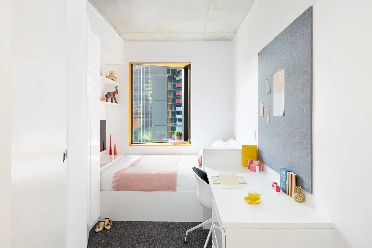 Bed desk and bulletin board bedroom at Scape Carlton in Melbourne Student Accommodation