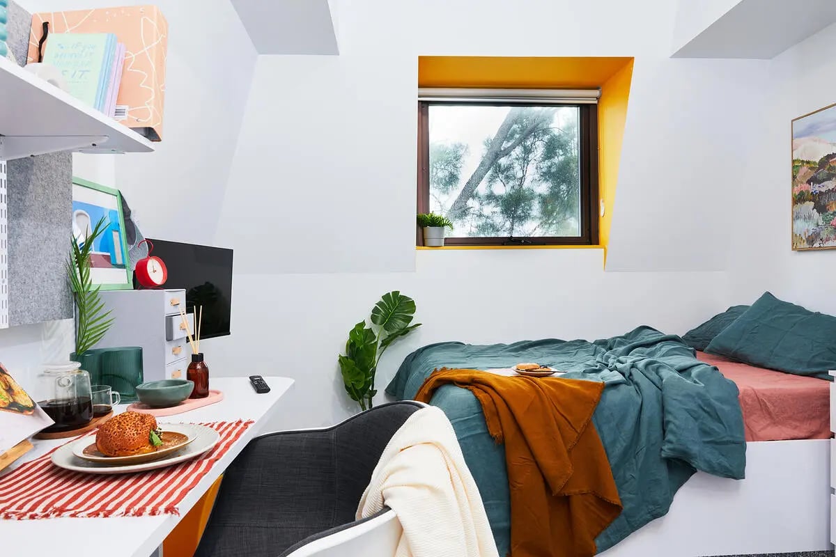 Bed desk television and window bedroom at Scape Darlington in Sydney Student Accommodation