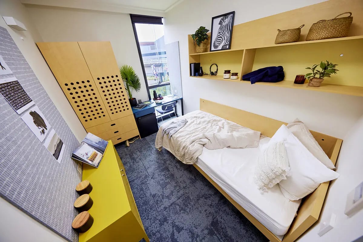 Bed desk wardrobe storage shelves bedroom at Scape Darling House in Sydney Student Accommodation