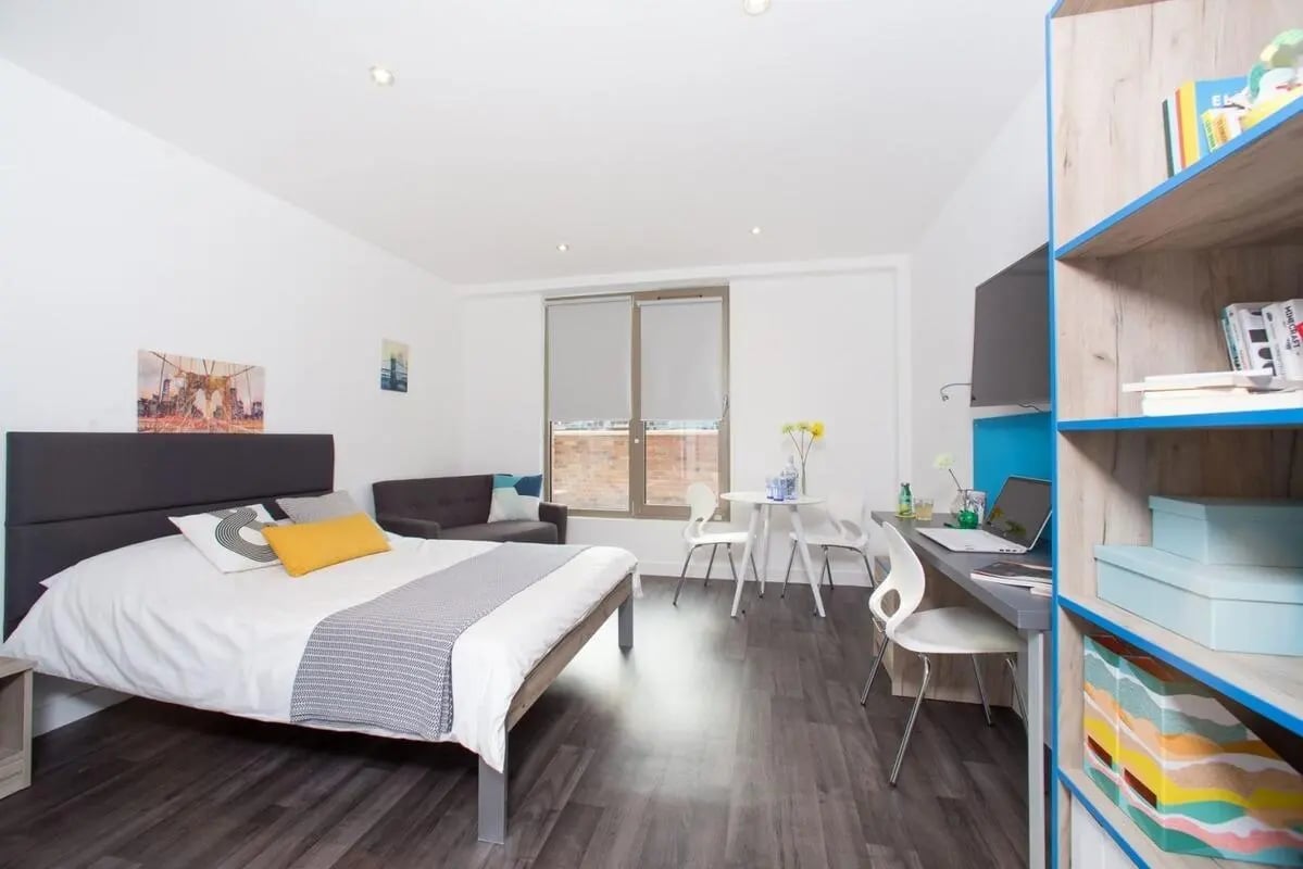 Bed desk sofa and shelving unit studio apartment at Northgate Point in Chester Student Accommodation