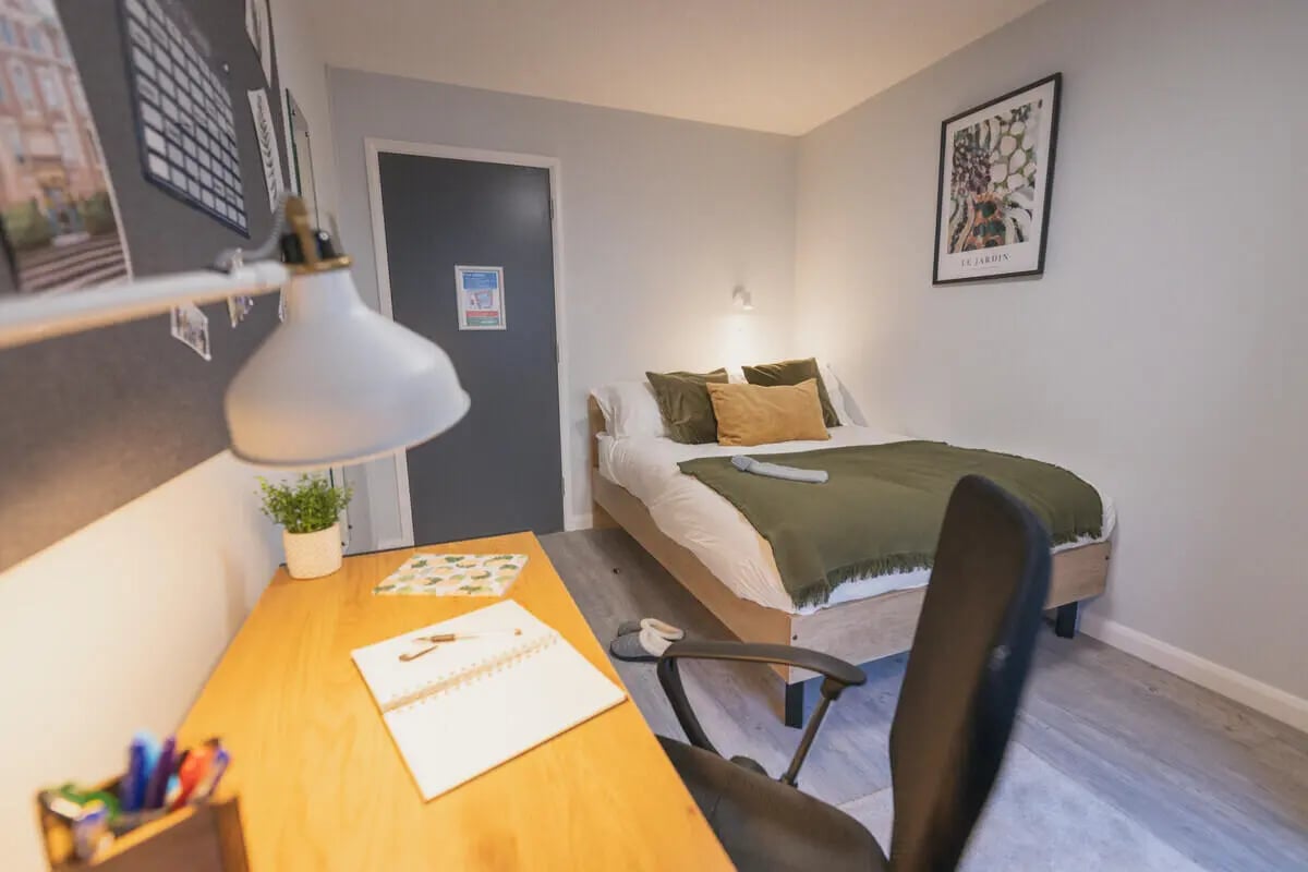 Desk bed and lamp student bedroom at Madison Gardens in Nottingham Student Accommodation