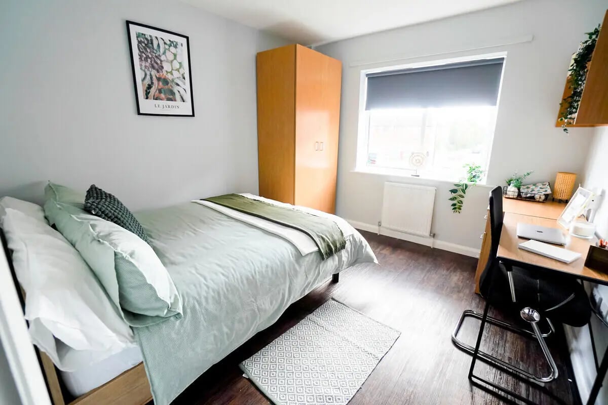 Bed desk wardrobe picture window bedroom at Madison Gardens in Nottingham Student Accommodation