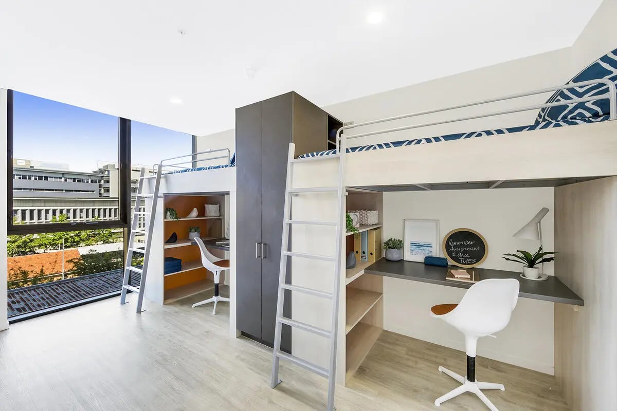 Loft beds desks chairs and storage study area at Scape Merivale in Brisbane Student Accommodation