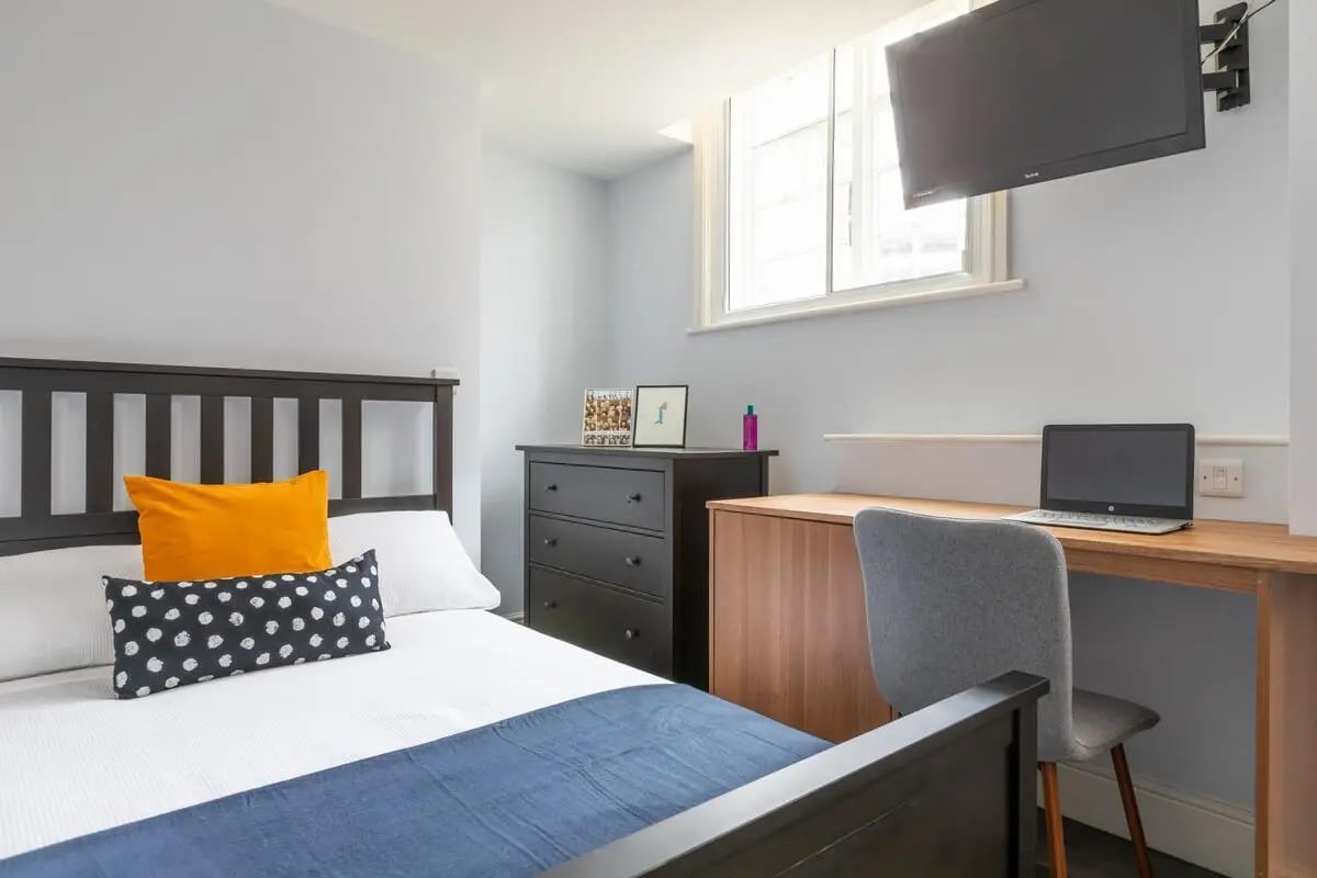 Bed desk laptop dresser TV bedroom study area at The Coach House in Nottingham Student Accommodation
