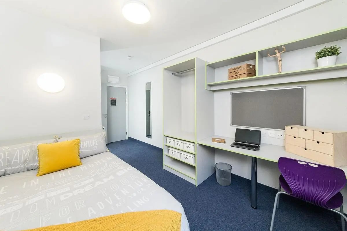 Bed laptop desk closet storage bedroom at Quayside Court in Newcastle Upon Tyne Student Accommodation