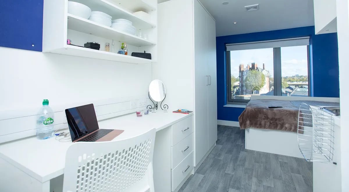 Desk mirror laptop bed wardrobe bedroom at The Cube Greenwich in London Student Accommodation
