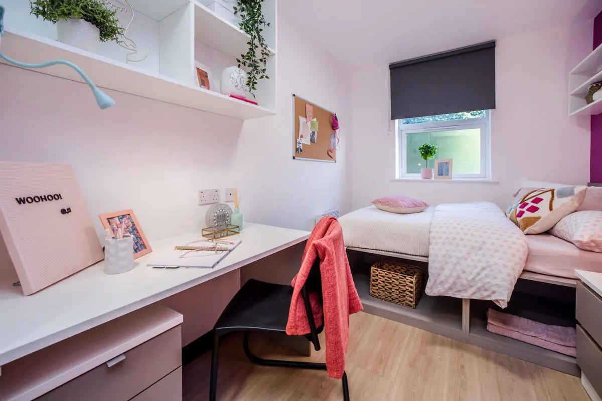 Desk bed with storage and plants bedroom at Crosstrend House in Lincoln Student Accommodation