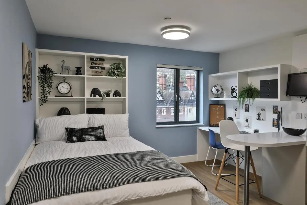 Bed desk shelving and window bedroom at Stonebridge House in Bristol Student Accommodation