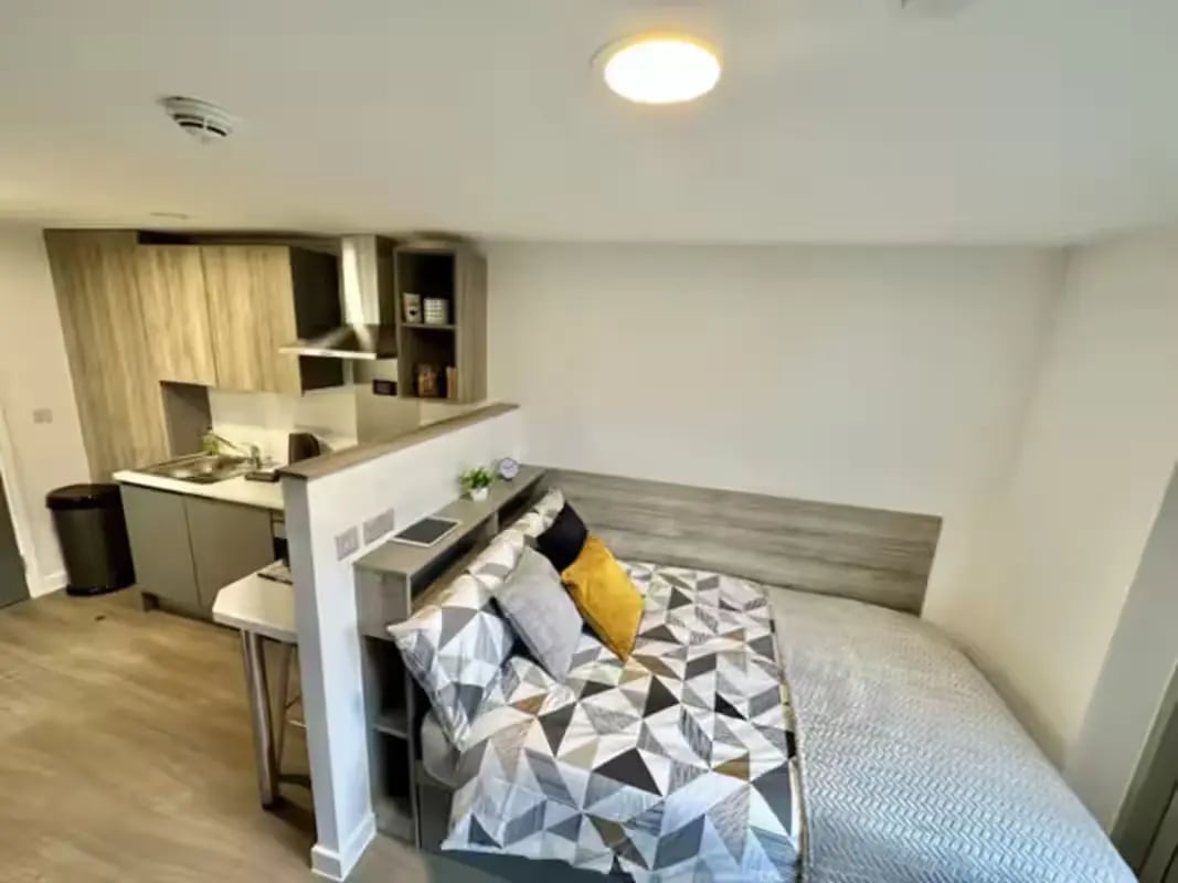 Bed kitchen and built in storage studio apartment at Albany Student Village in Coventry Student Accommodation
