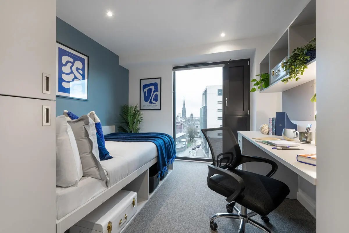 Bed desk storage and chair study area at Infinity Coventry in Coventry Student Accommodation