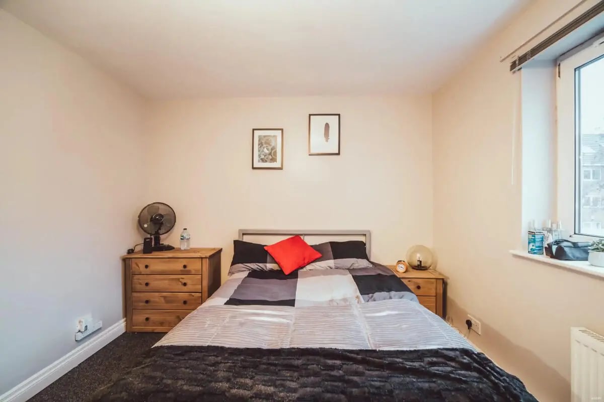 Bed with bedside tables and fan bedroom at Chancellor's Court in Manchester Student Accommodation