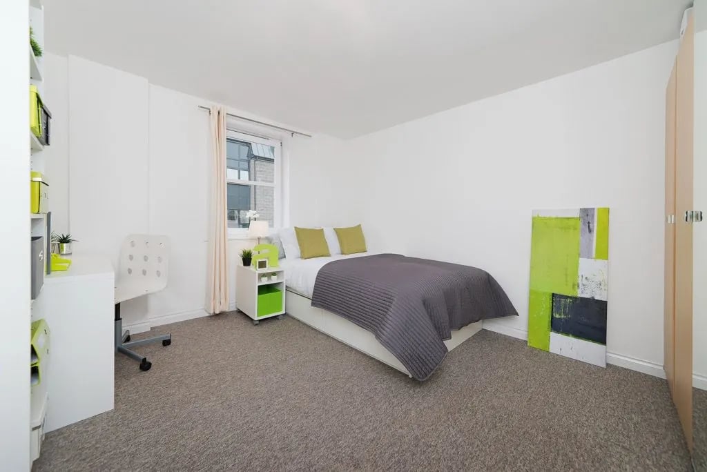 Bed desk chair nightstand abstract art bedroom at Froghall in Aberdeen Student Accommodation