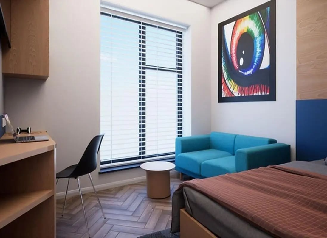 Desk chair sofa art and bed bedroom at The Orchard in Leicester Student Accommodation