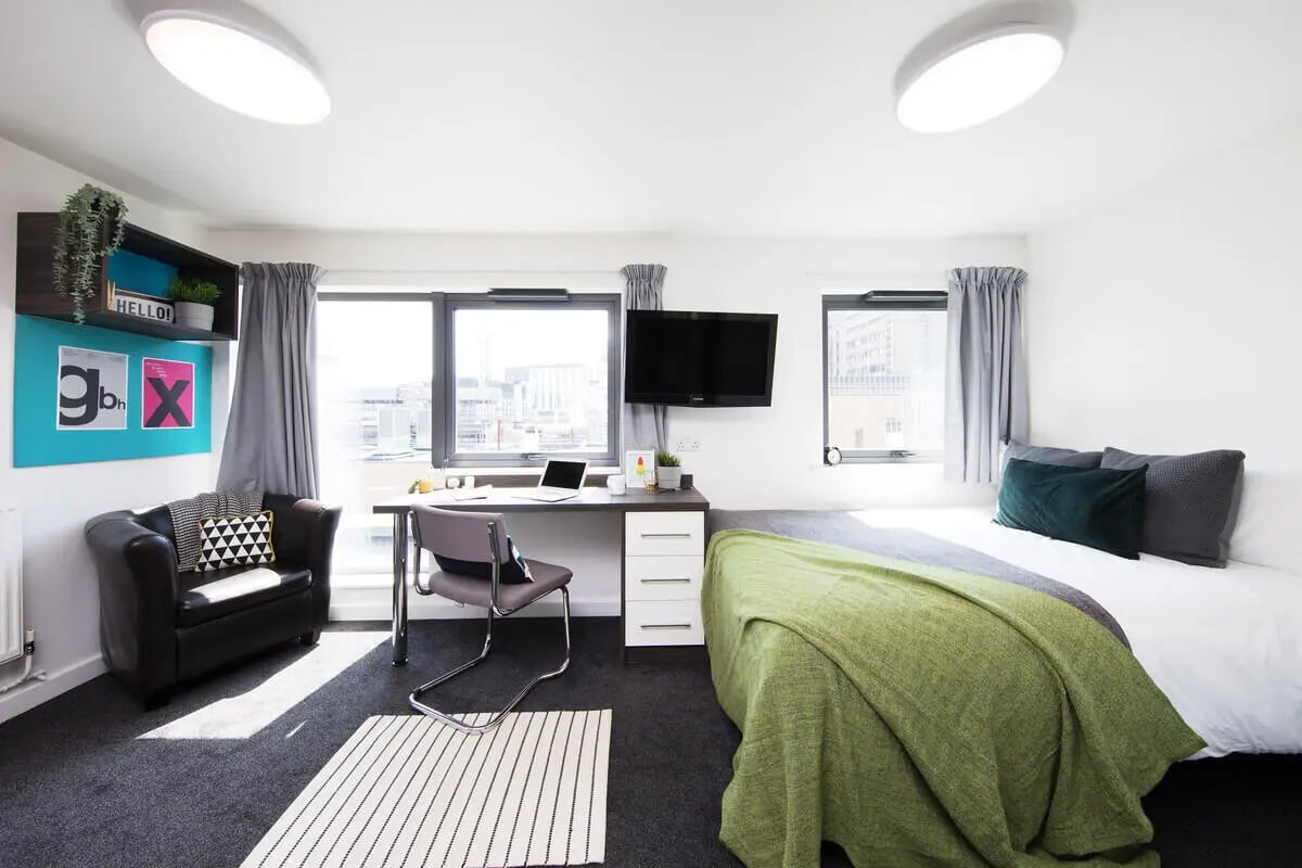 Bed desk chair sofa television bedroom at Prospect Point in Liverpool Student Accommodation