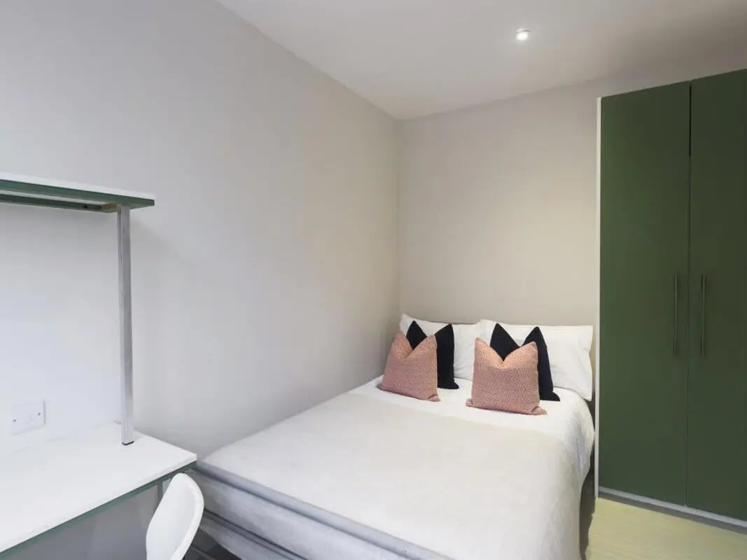 Bed desk green wardrobe bedroom at 31 Guildford Street in Stoke-On-Trent Student Accommodation