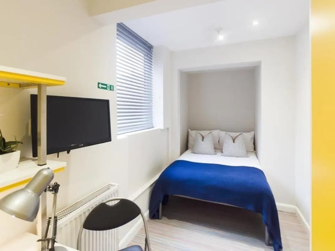 Bed desk TV and blinds bedroom. at 28 Seaford Street in Stoke-On-Trent Student Accommodation