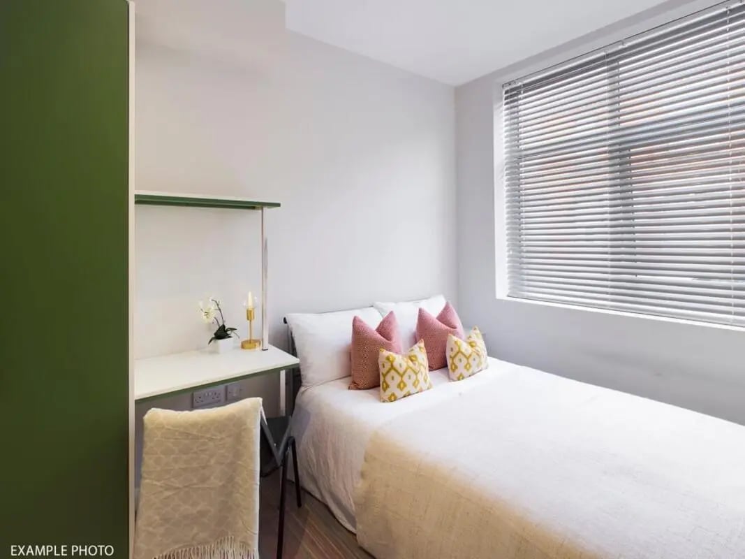 Bed desk chair green wardrobe study area bedroom at 29 Guildford Street in Stoke-On-Trent Student Accommodation