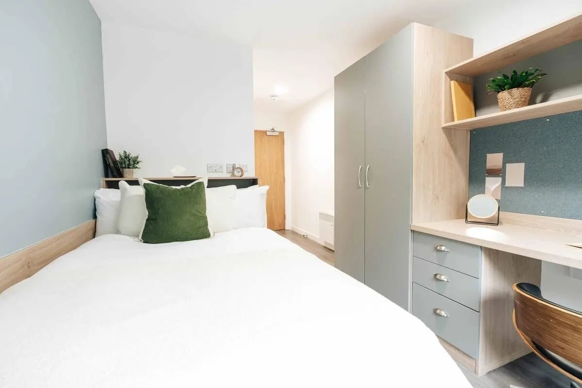 Bed wardrobe desk with mirror bedroom at Caledon Court in Aberdeen Student Accommodation