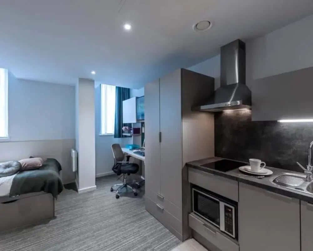 Bed desk kitchen and wardrobe studio apartment at Verde in Newcastle Upon Tyne Student Accommodation