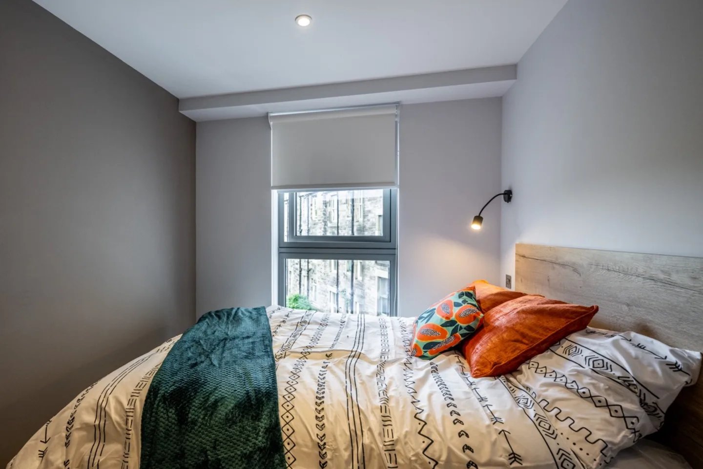 Bed with patterned duvet and pillows Bedroom at Murieston Crescent - Edinburgh in Edinburgh Student Accommodation