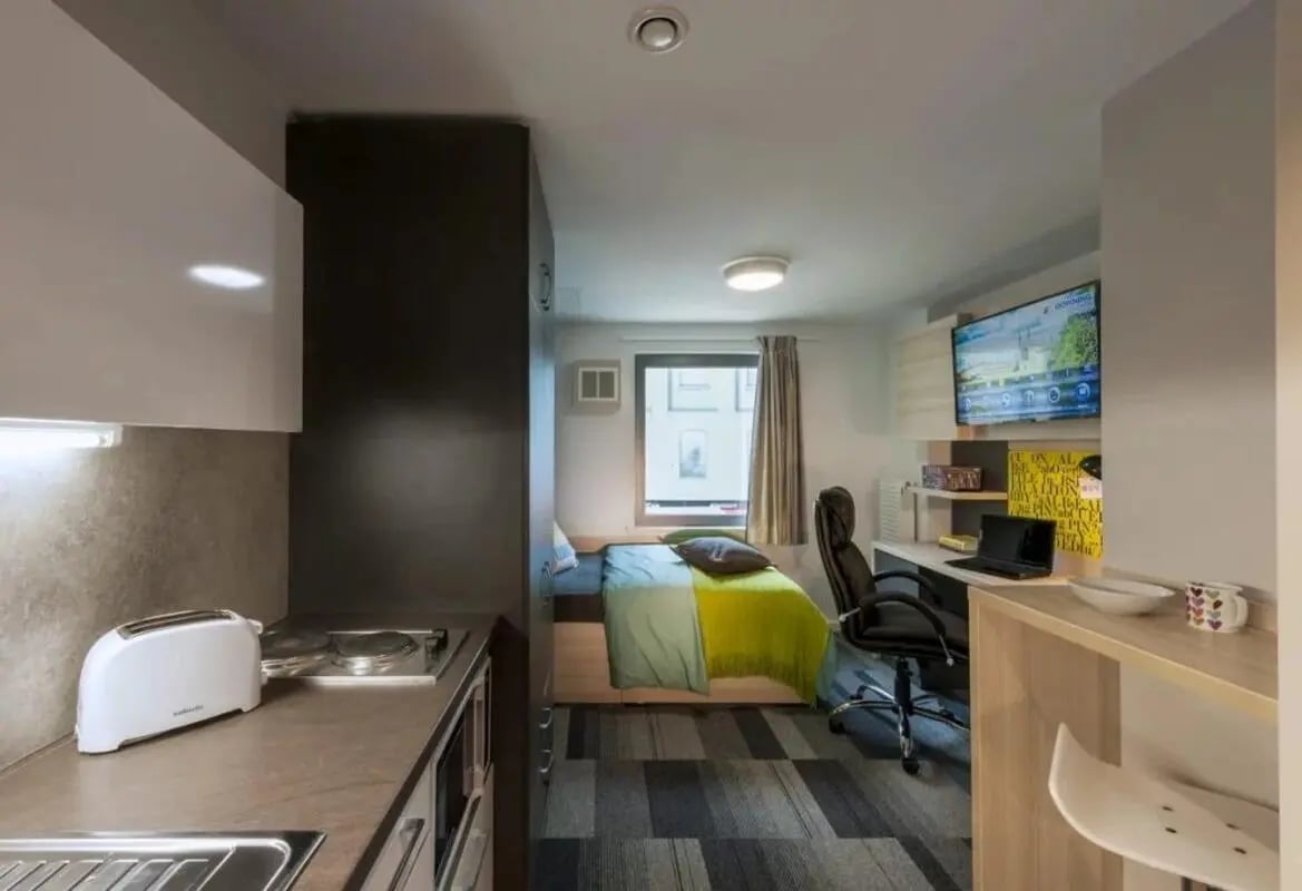 Kitchen bed desk chair television study area. at The Railyard Cambridge in Cambridge Student Accommodation