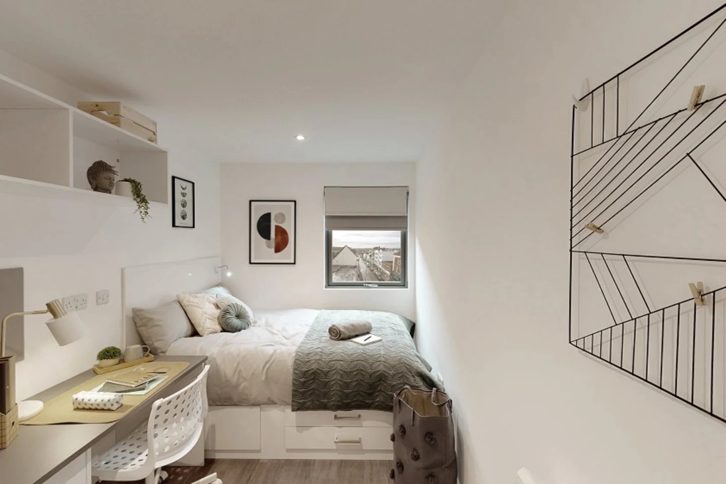 Bed desk lamp artwork and shelves bedroom at The City Arcade - Exeter in Exeter Student Accommodation