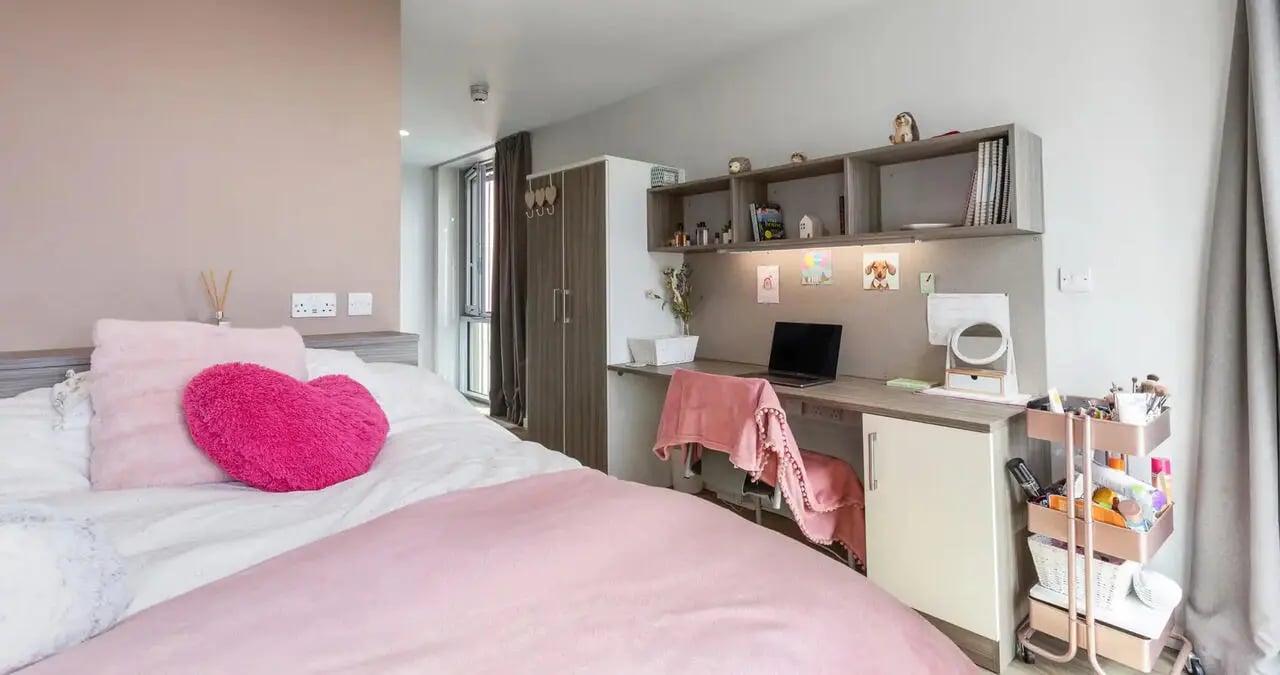 Bed desk wardrobe and shelves bedroom at Kaplan Living Brighton in Brighton Student Accommodation
