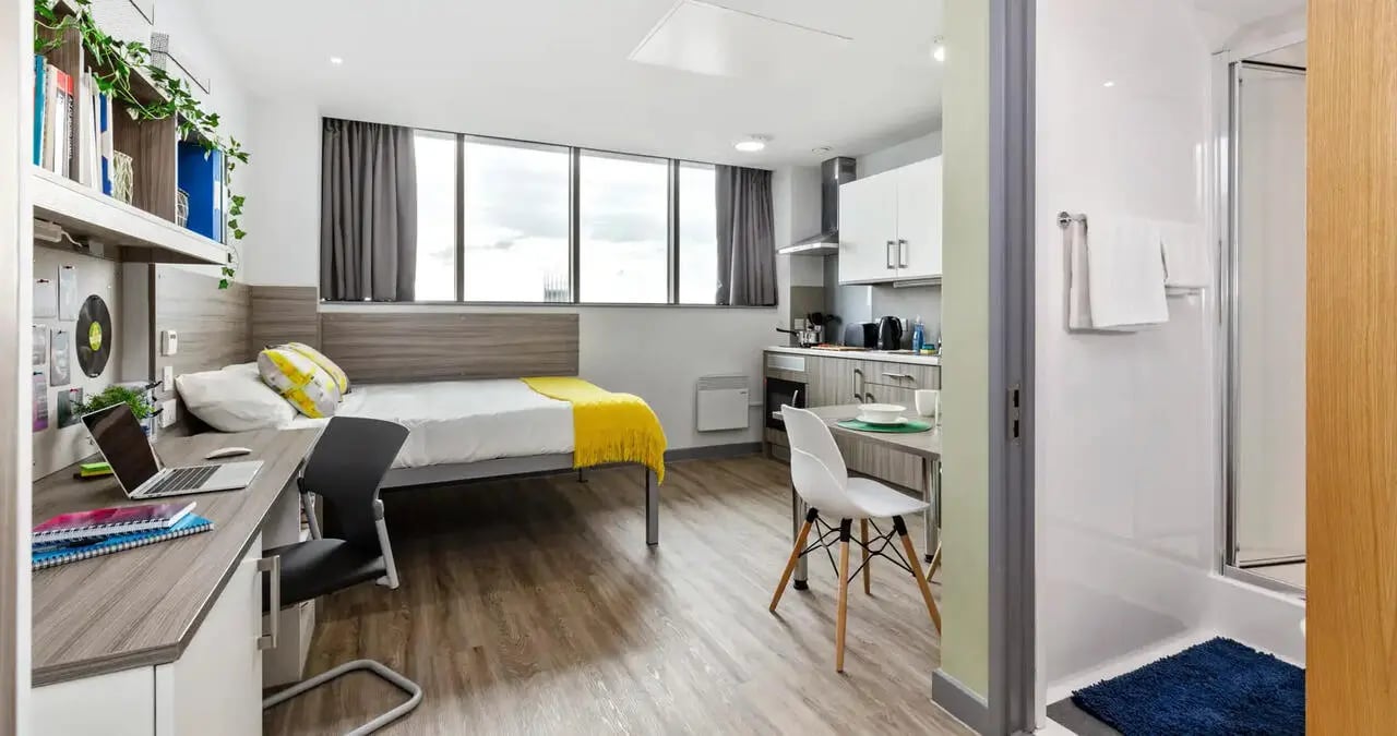 Bed desk kitchen and shower room living area at Kaplan Living Liverpool in Liverpool Student Accommodation