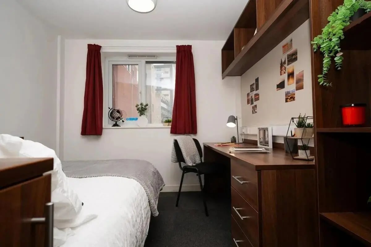 Bed desk chair and shelving Student bedroom at Walker Street in Preston Student Accommodation