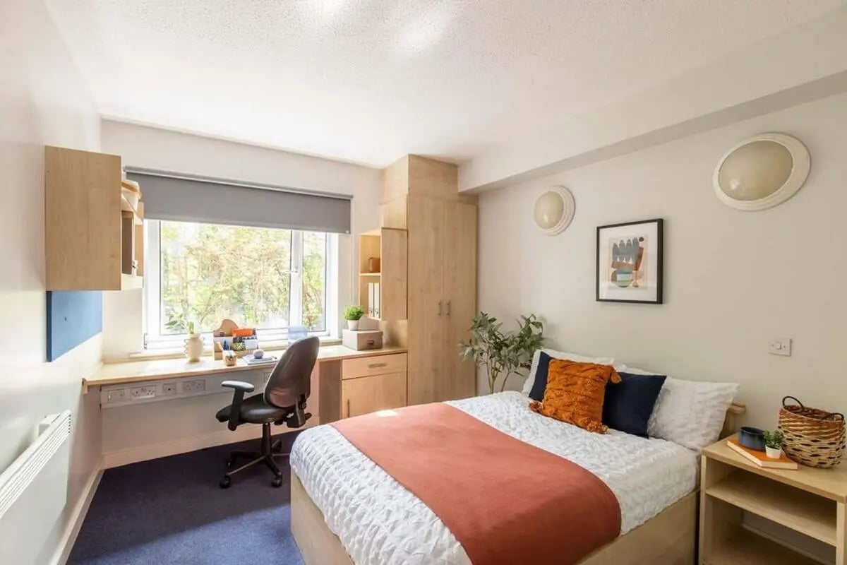 Bed desk wardrobe and window bedroom at Charlotte Court in Sheffield Student Accommodation