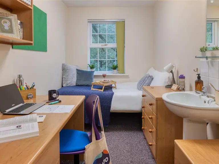 Desk bed sink and dresser bedroom at Cable Street Lancaster in Lancaster Student Accommodation