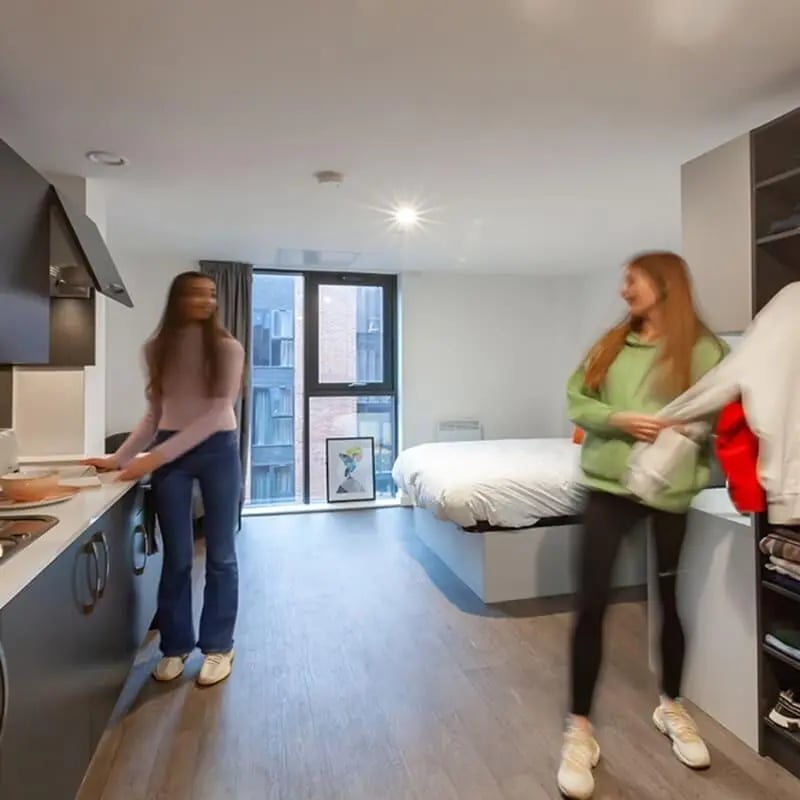 Two students in a modern studio apartment studio apartment at True Liverpool in Liverpool Student Accommodation