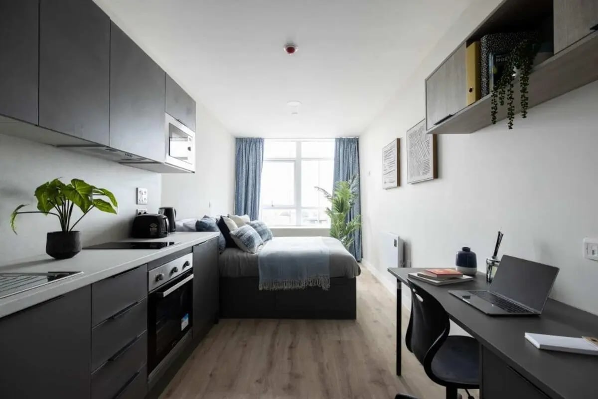 Kitchen bed desk and laptop student studio at Boutique Student Living Swansea in Swansea Student Accommodation