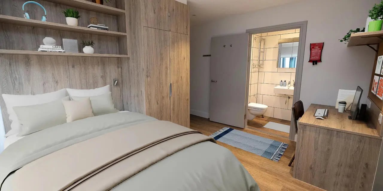 Bed desk and bathroom visible Bedroom at Canvas Student - Quintana Gate in Exeter Student Accommodation