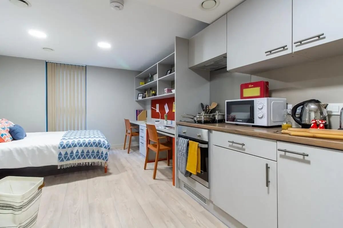 Bed desks microwave kettle studio apartment. at Calico in Liverpool Student Accommodation