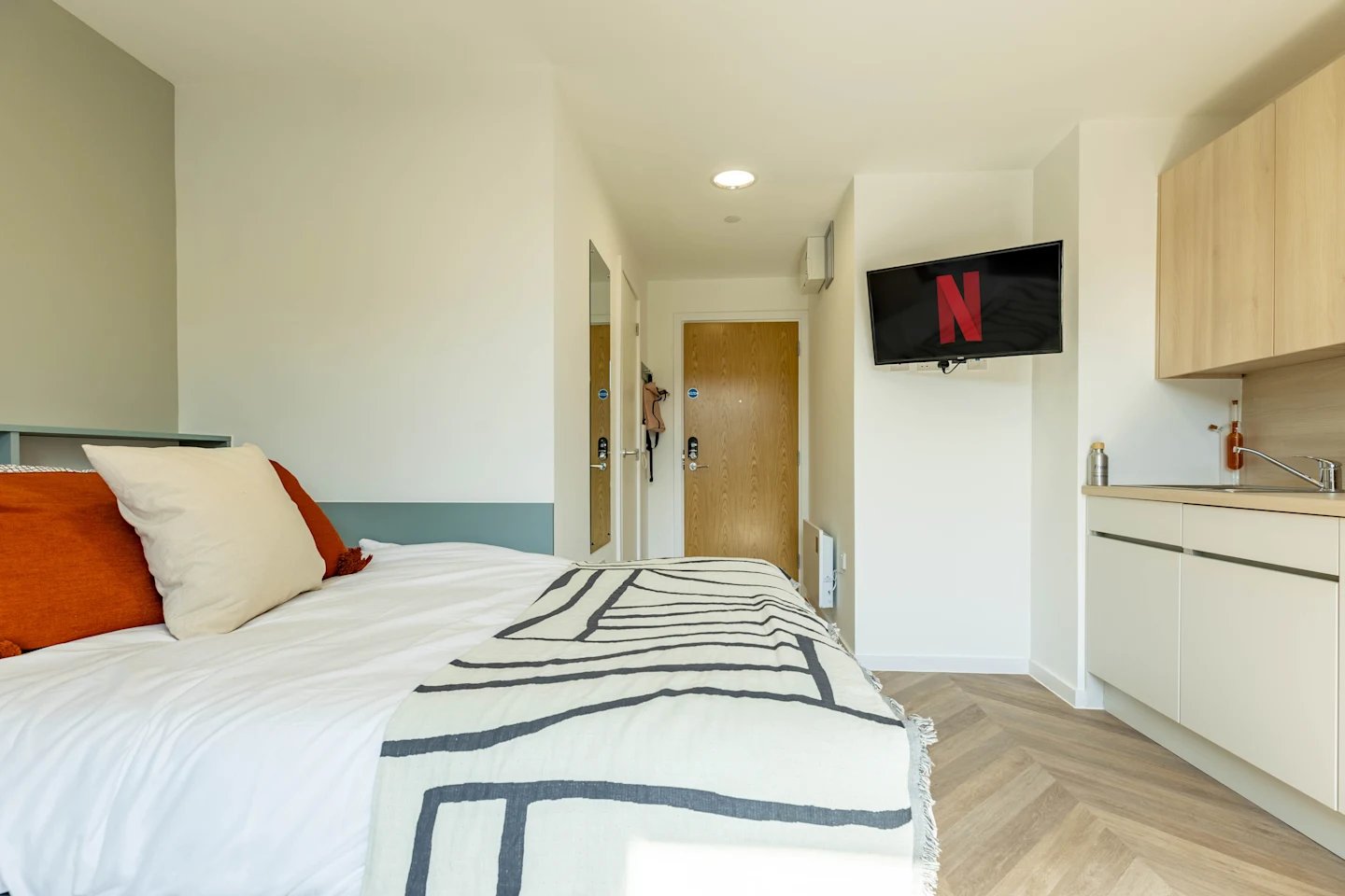 Bed kitchen area with Netflix TV bedroom at The Brook in Bath Student Accommodation