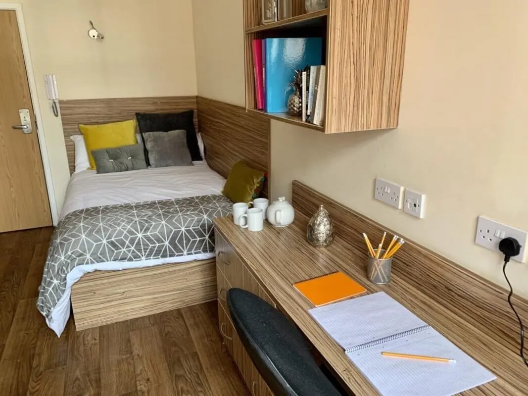 Bed desk study items and accessories bedroom at Trinity Hall in Chester Student Accommodation