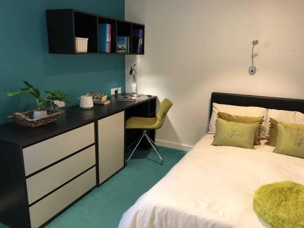 Desk bed chair shelving unit bedroom at Plato House in Liverpool Student Accommodation