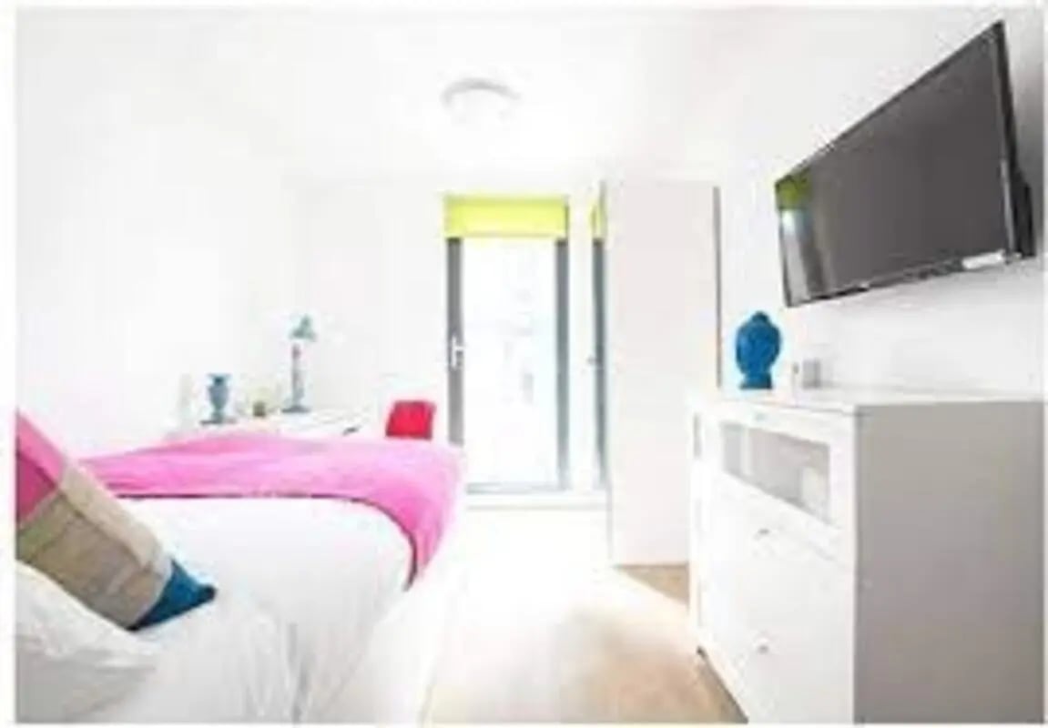 Bed dresser TV door window bedroom at Chapel Street in Salford Student Accommodation