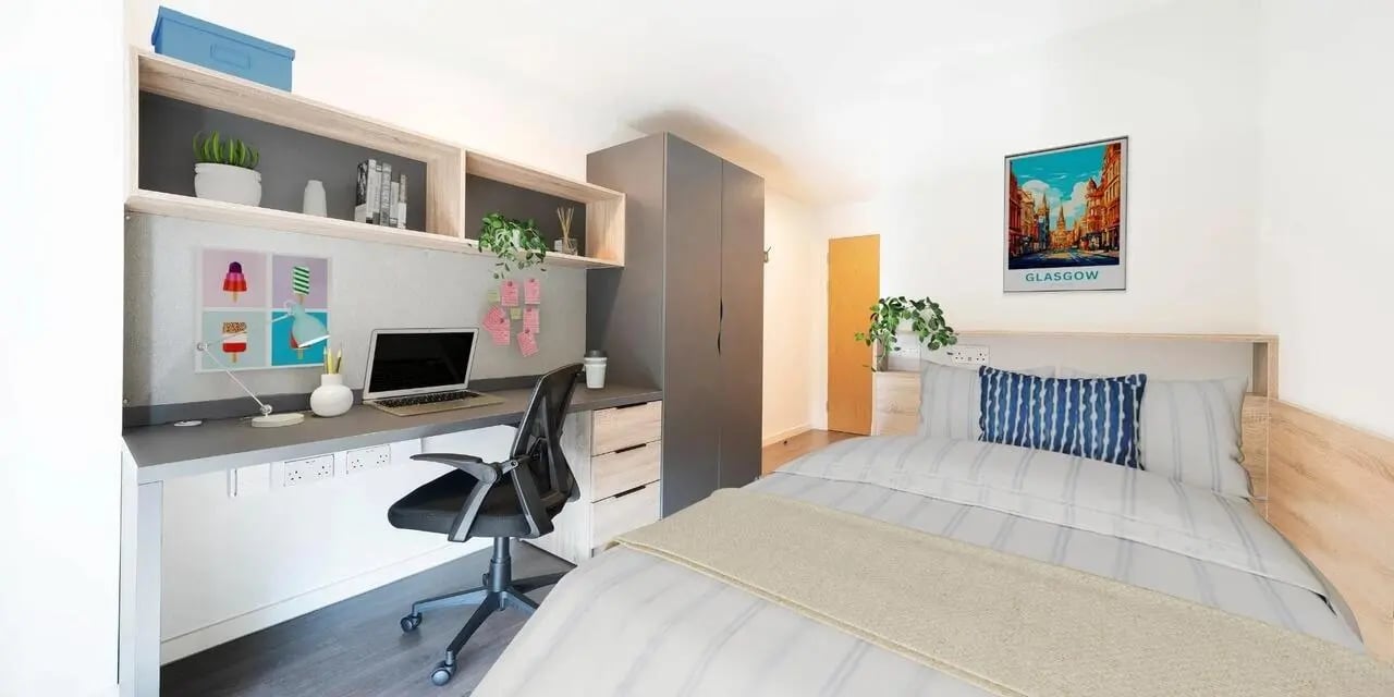 Desk bed and wardrobe student accommodation bedroom at Canvas Glasgow in Glasgow Student Accommodation