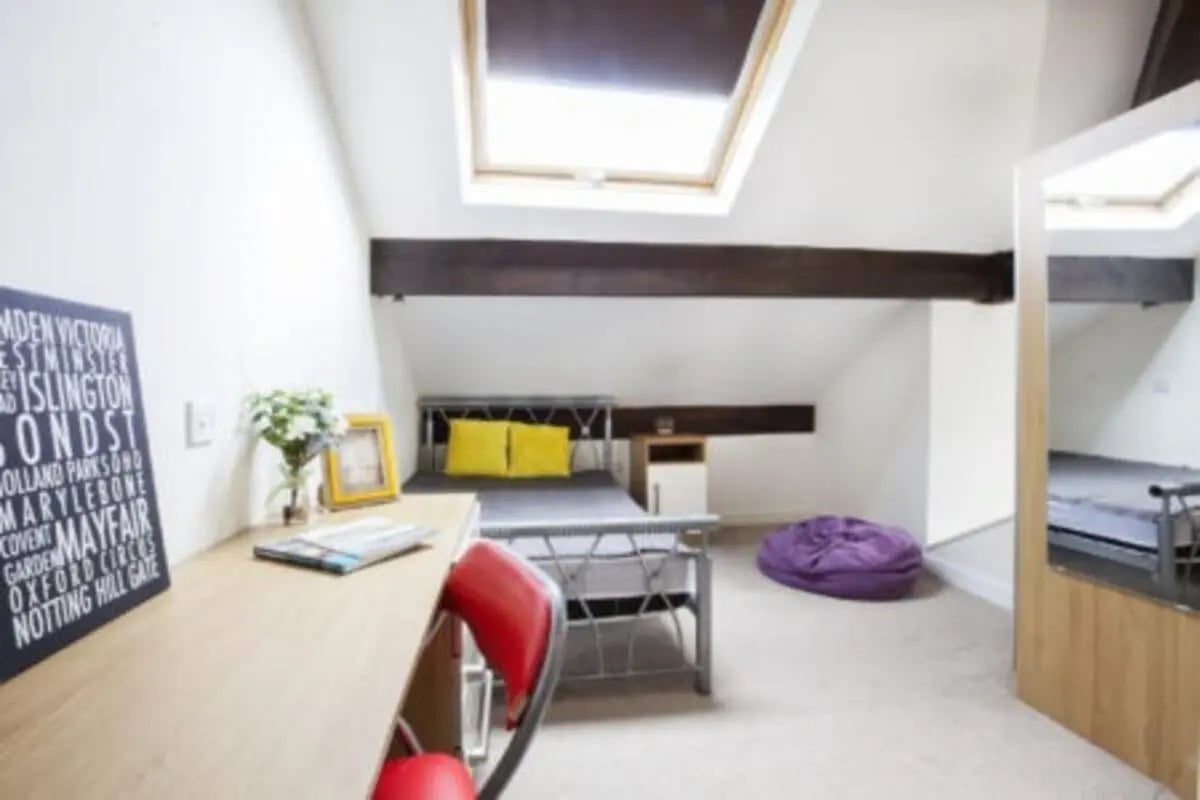 Bed desk chair beanbag and skylight bedroom at The Old Chapel in Huddersfield Student Accommodation
