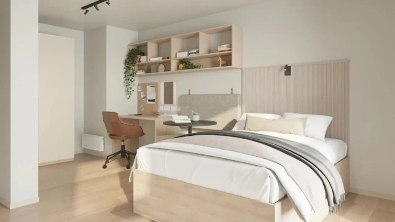 Bed desk shelves chair and wardrobe bedroom at Apollo Court in Liverpool Student Accommodation