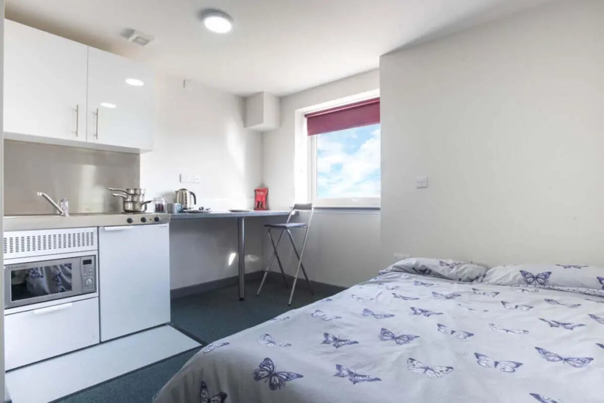 Studio apartment with kitchen and bed bedroom at Stoke Student Village in Stoke-On-Trent Student Accommodation