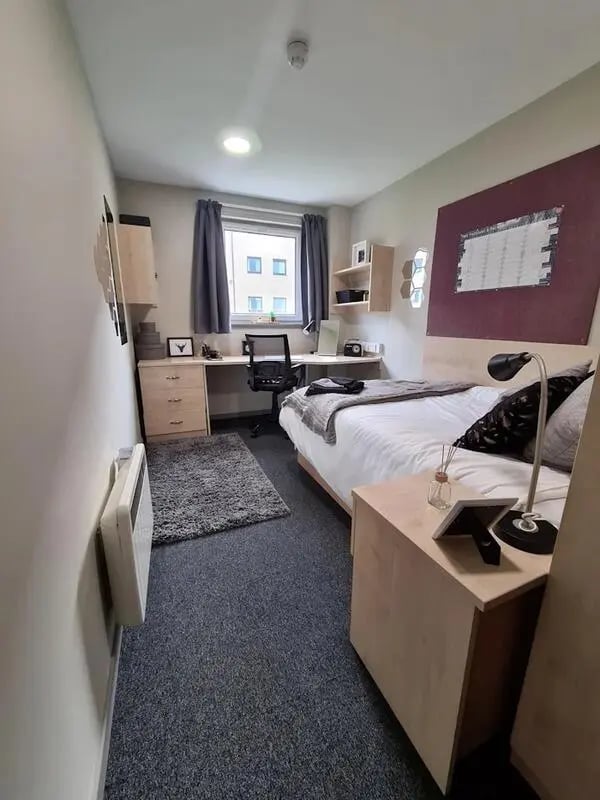 Bed desk heater and rug bedroom at Buchanan View in Glasgow Student Accommodation