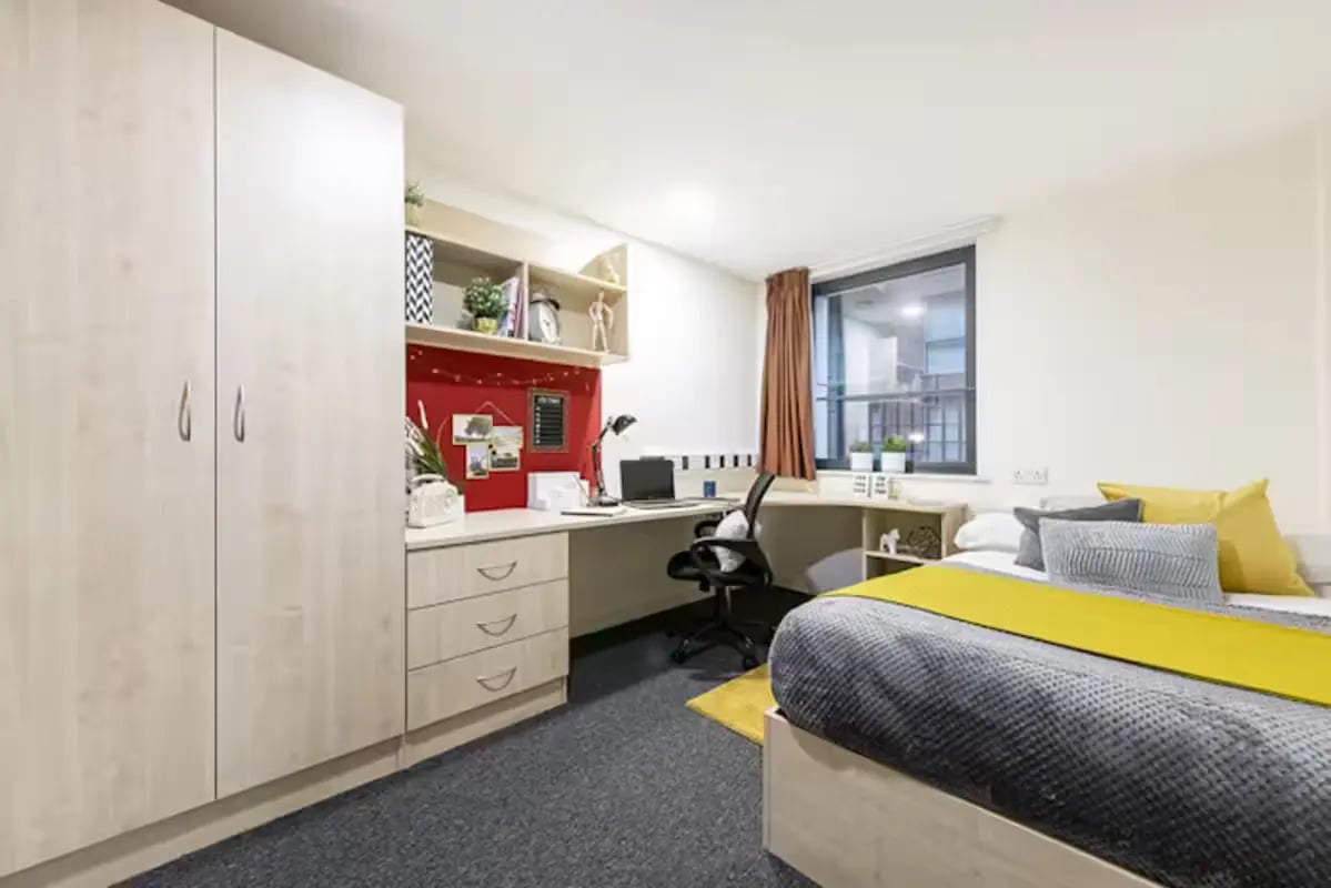 Wardrobe desk chair bed window study area bedroom at Sheffield 3 in Sheffield Student Accommodation