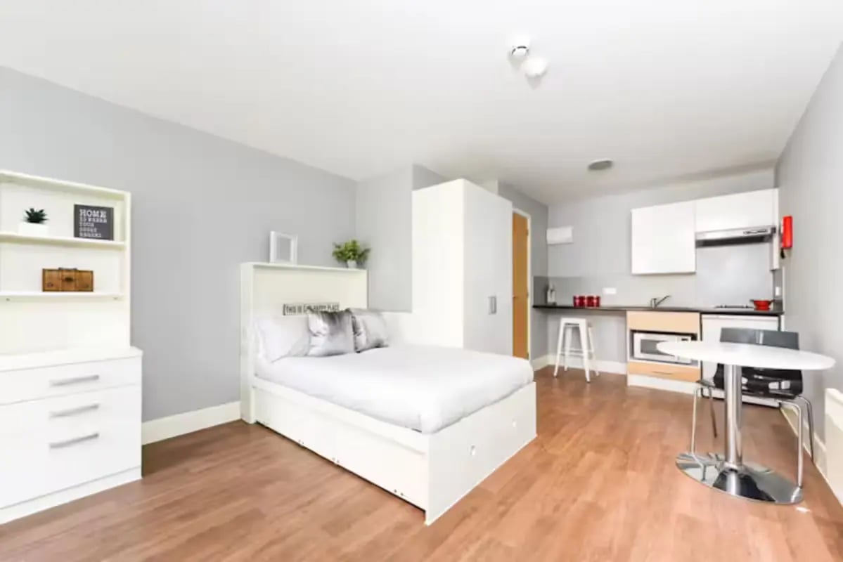 Bed kitchen and dining area studio apartment at Tramways in Chester Student Accommodation