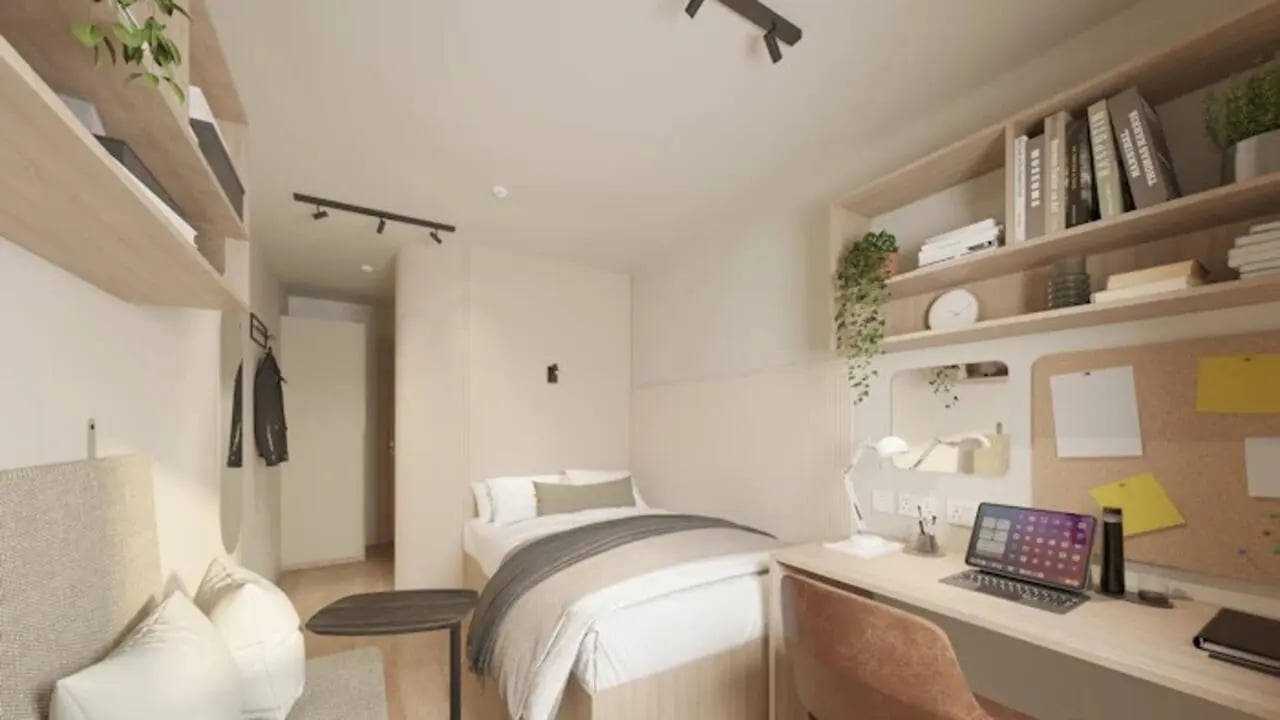 Bed desk shelves and jacket student bedroom at Gibson Street in Glasgow Student Accommodation